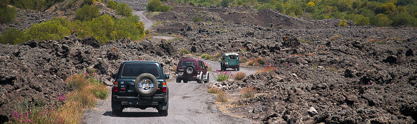 Lava fields along the way to the upper Etna slopes during a group Etna 4wd excursion